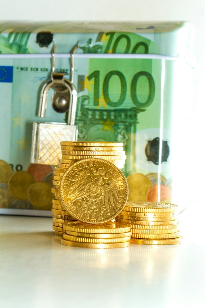 Euro money box with gold coins