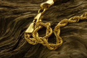 gold chain necklace on the tree